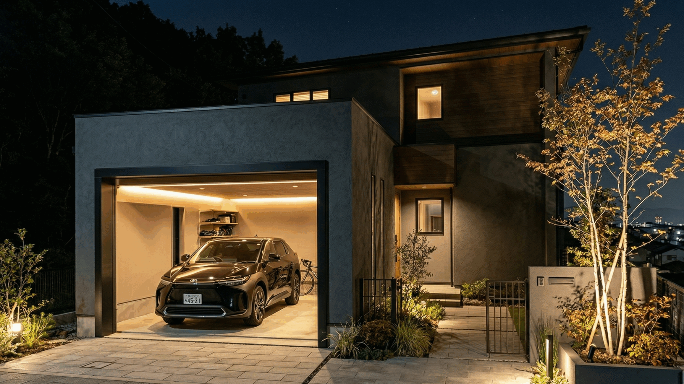 ガレージのある二階建て戸建て住宅の夜景イメージ